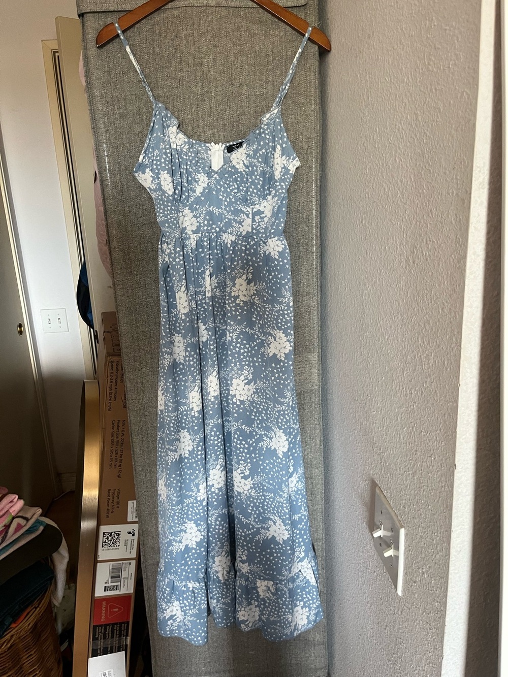 Light Blue Floral Maxi dress size s. Dress is 47 inches long w/adjustable straps